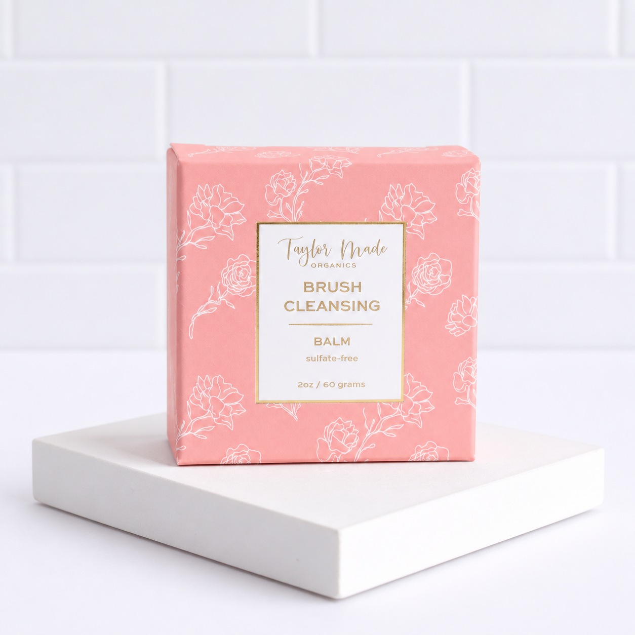Taylor Made Organics sulfate-free brush cleansing balm in a box, ideal for cleaning makeup brushes gently and effectively.