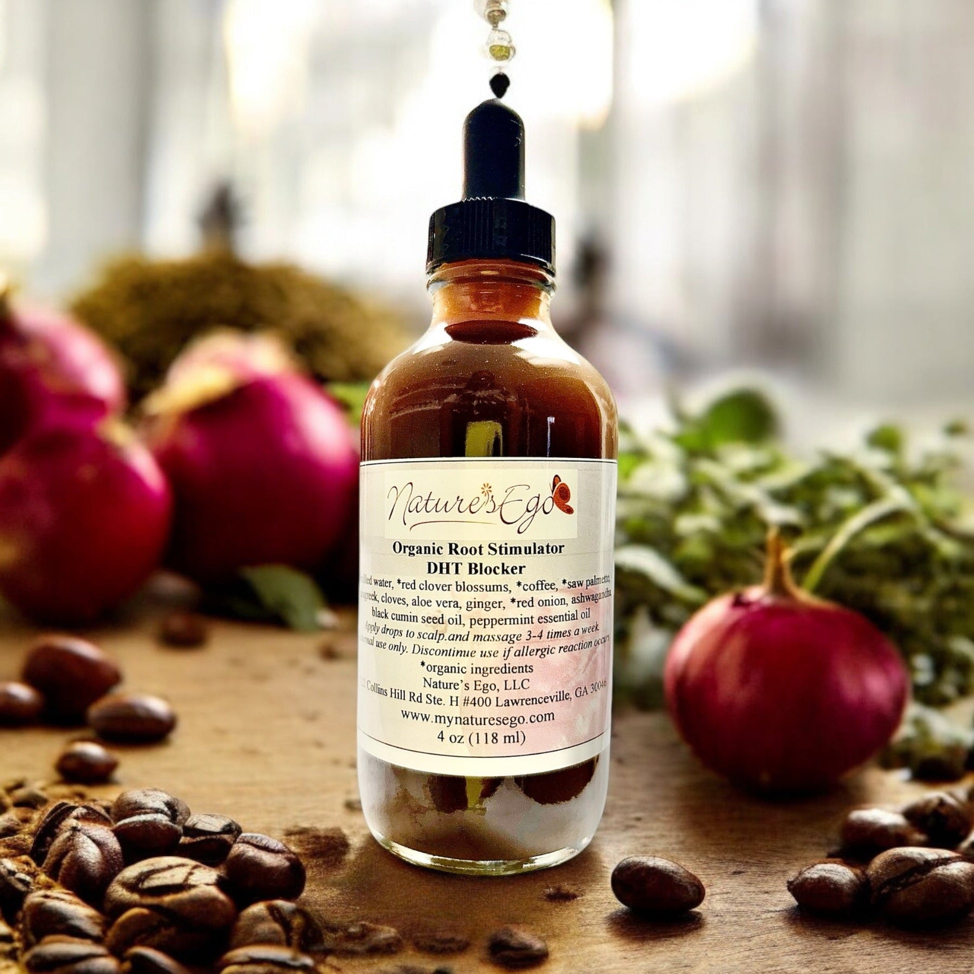 Organic Root Stimulator by NaturesEgo, bottle with label, showcasing natural hair growth treatment for healthy roots and hair.