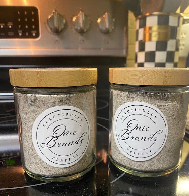 Onic Brands LLC cappuccino drink mix in a jar, creamy coffee-flavored powder with a spoon, ready to make a hot or iced cappuccino.