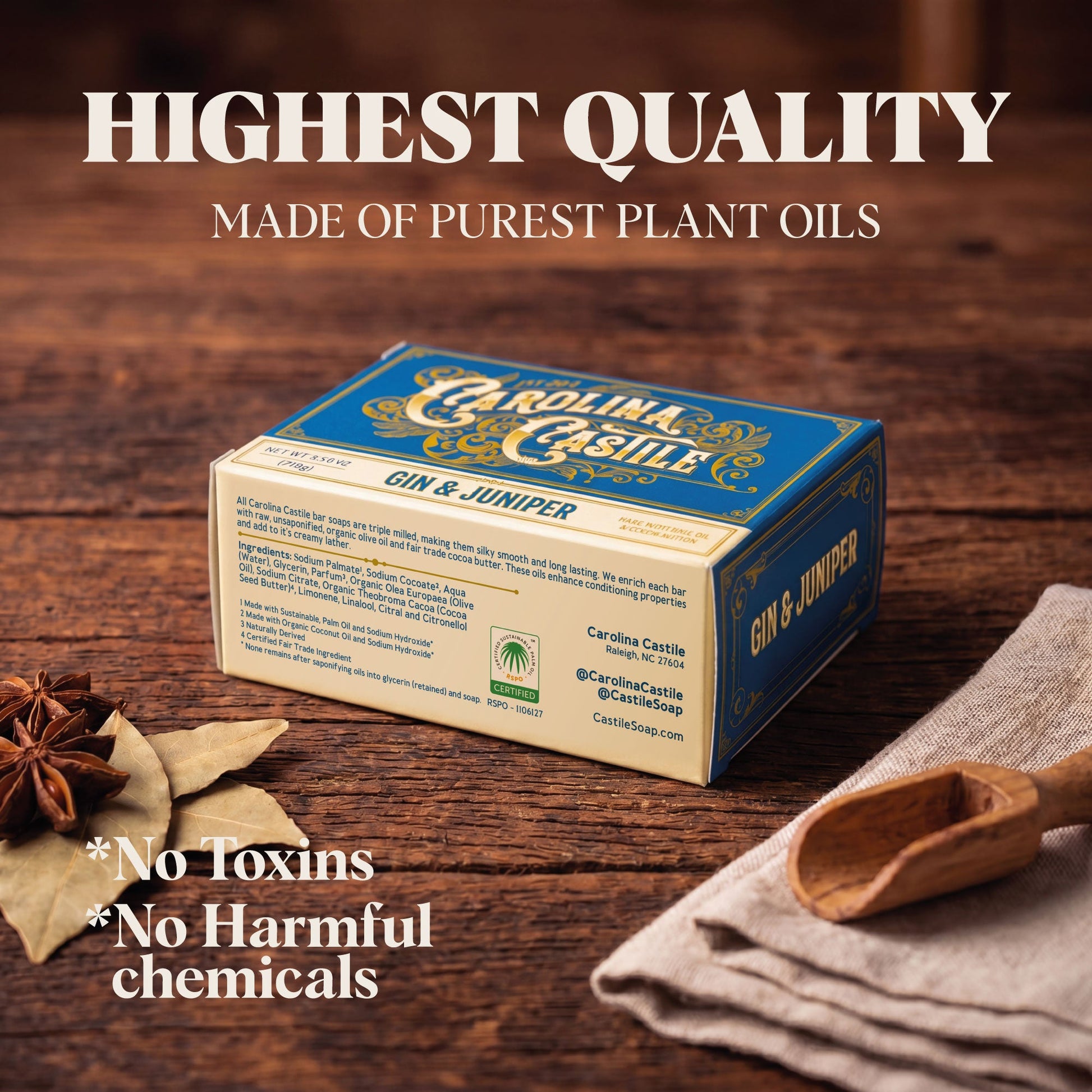 Castile bar soap featuring gin and juniper botanicals by Carolina Castile Soap, displayed with a rustic soap wrapper and fresh juniper berries.