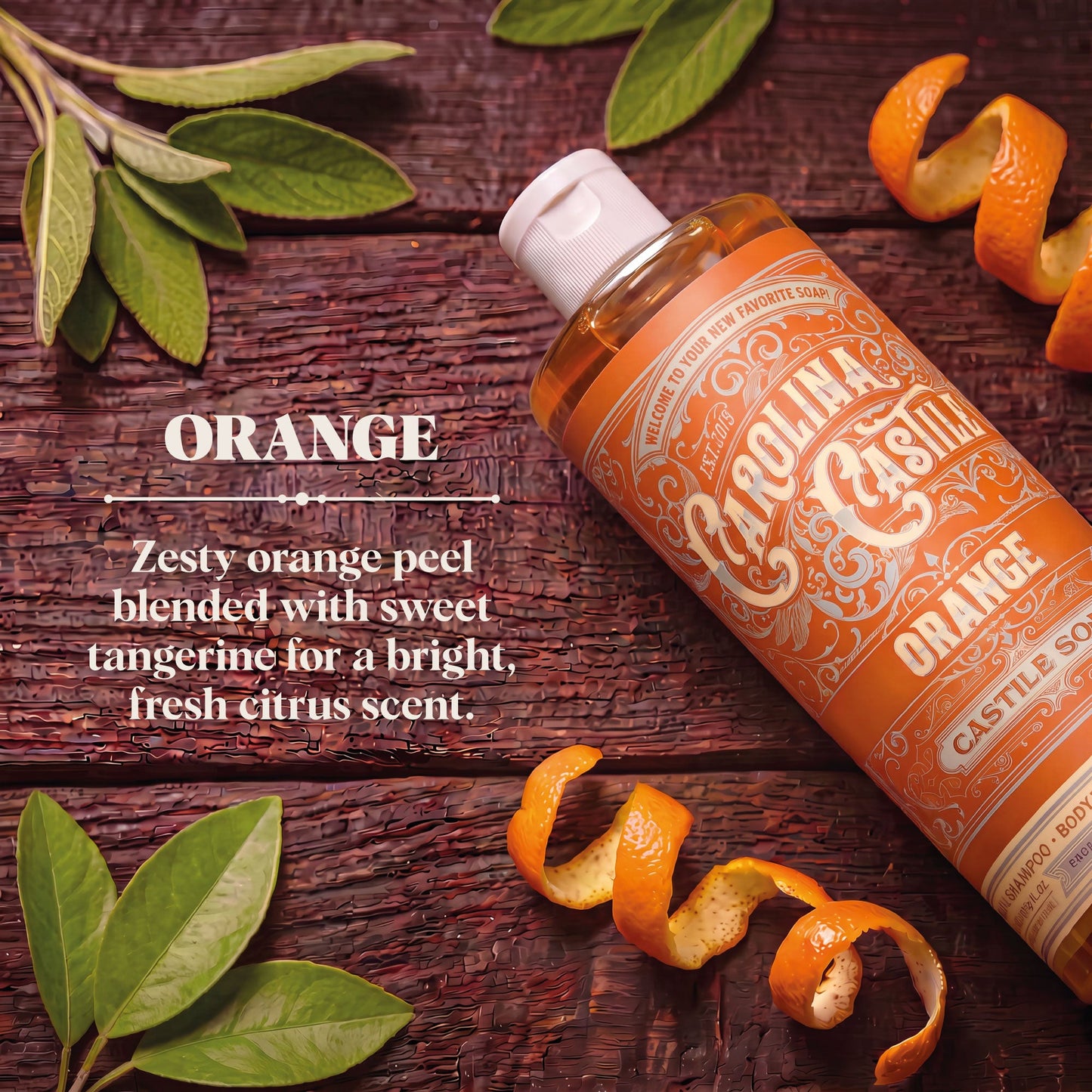 Orange Carolina Castile Soap in a clear bottle with a pump dispenser, showcasing vibrant orange liquid and brand label.