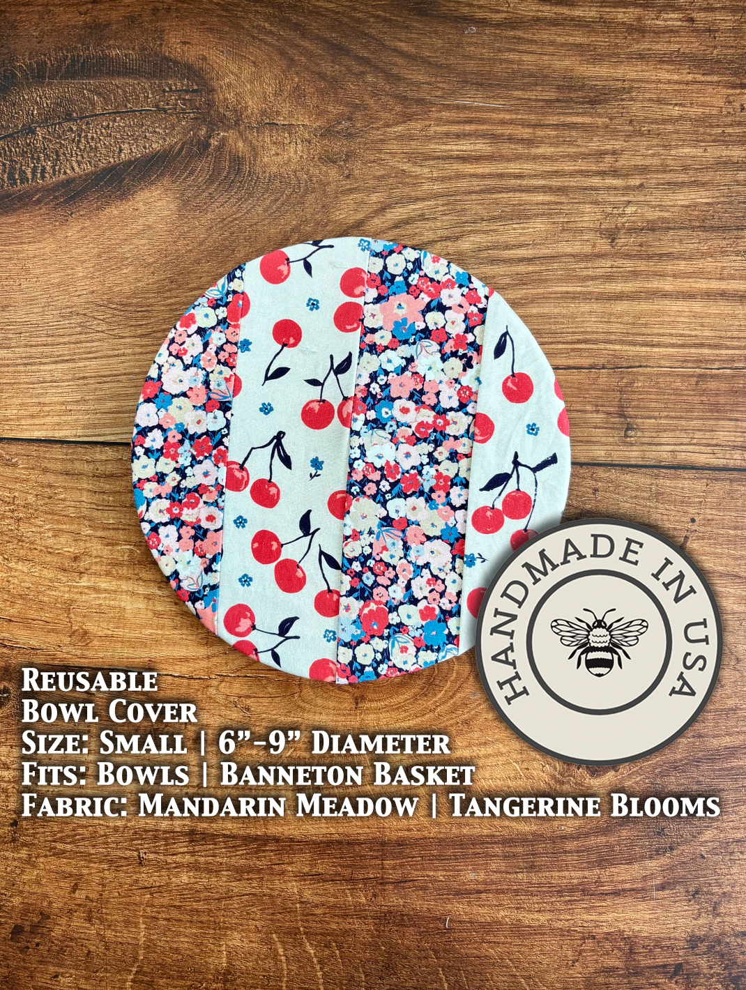 Small bowl and Banneton covers from Five Oaks Farm, placed among fresh cherries and cream in a vibrant garden setting.