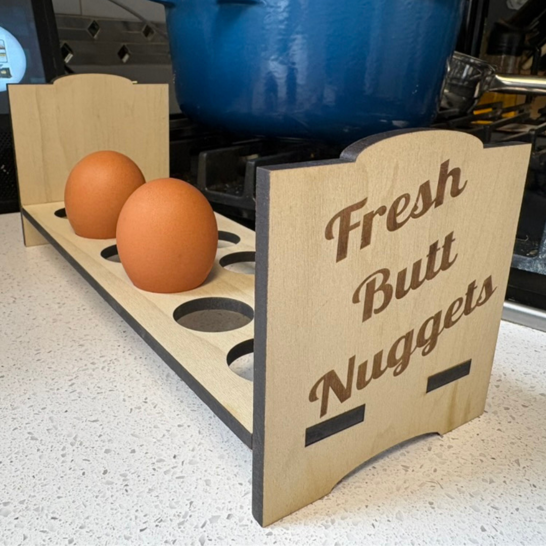 Counter top chicken egg holder by Quailz.com, featuring a stylish design for storing fresh chicken eggs and butt nuggets.