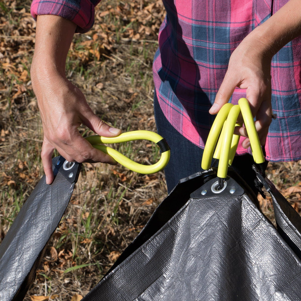 Allsop Home & Garden Clean-Up Canvas with durable fabric and handles, designed for cleaning and organizing tasks.