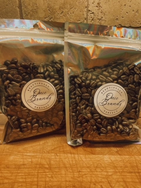 Onic Brands LLC Nicaraguan dark roast coffee bag, showcasing rich, dark roasted coffee beans in a packaging design.