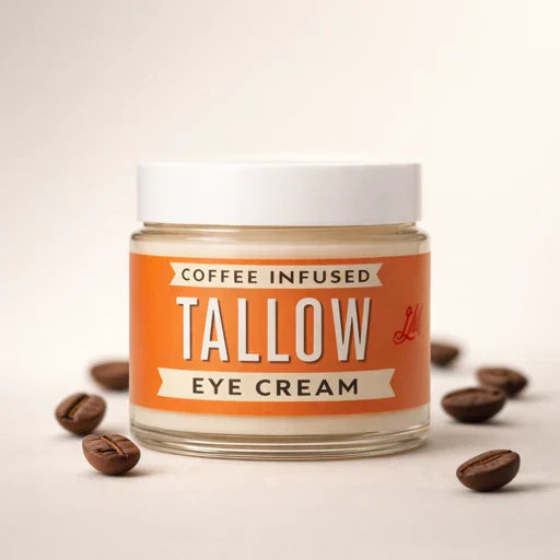 Close-up of The Lady May Coffee-Infused Tallow Eye Cream jar showing creamy texture and natural ingredients for brightening and revitalizing skin.
