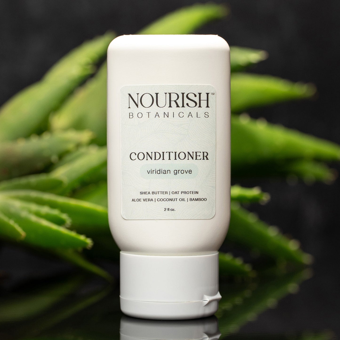 Rustic Strength Botanical Sample Set conditioner bottle from Viridian Grove Bath & Body collection, 2 oz with natural label design.