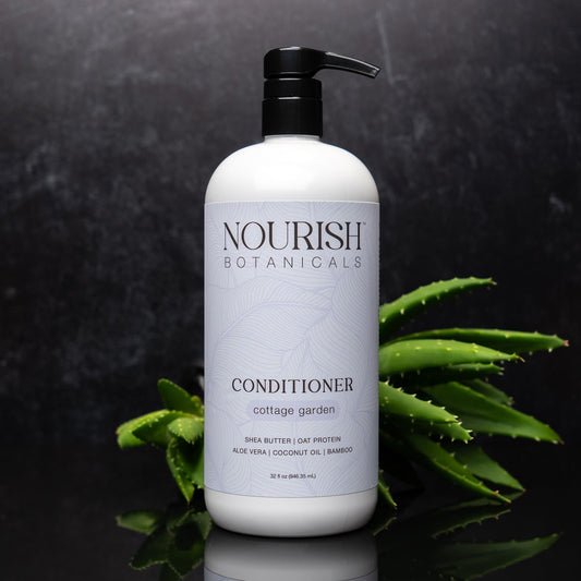 Rustic Strength Aloe Vera Conditioner in a 32oz bottle, featuring a natural ingredient-rich formula for healthy, shiny hair.