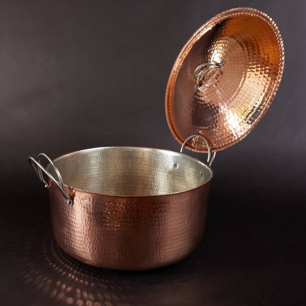 Sertodo copper Dutch oven with lid, showcasing a large, polished copper pot with a handle on the lid for versatile cooking.