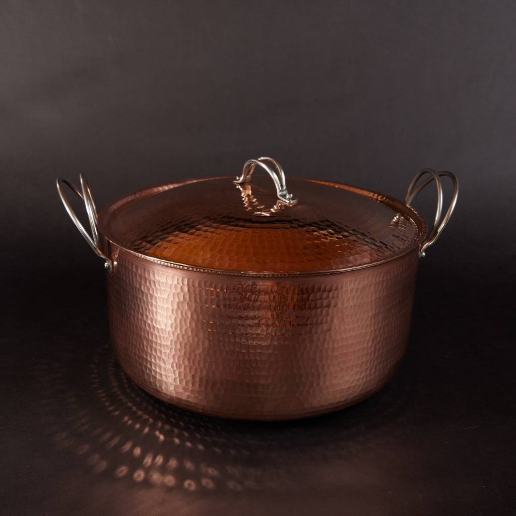 Large copper Dutch oven from Sertodo, durable pot for cooking and baking, with a polished finish and sturdy handles.