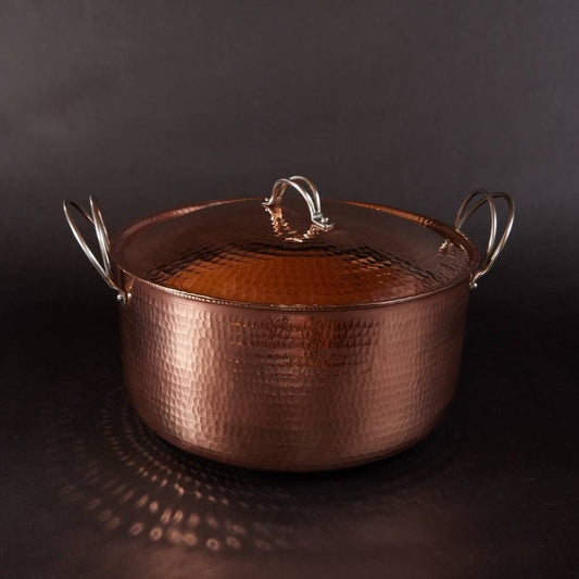 Large copper Dutch oven from Sertodo, durable pot for cooking and baking, with a polished finish and sturdy handles.