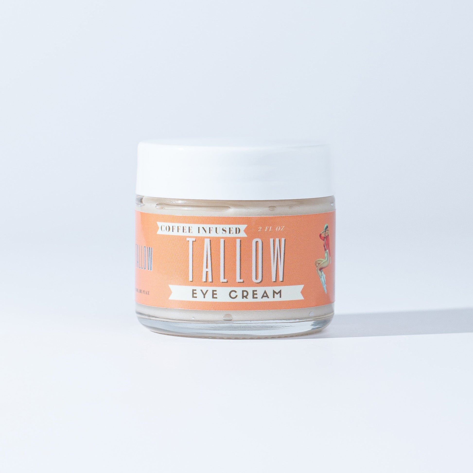 Lady May Tallow natural caffeine eye cream jar showing the front label with product name and branding on a white background.