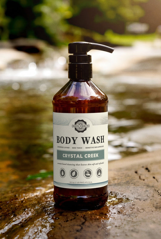 Rustic Strength Crystal Creek moisturizing body wash bottle with label and pump, designed for gentle cleansing and hydration.