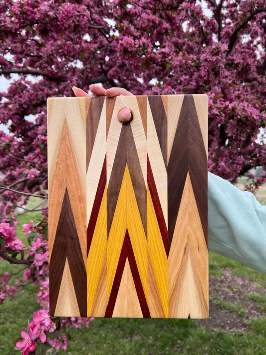 Handcrafted Amish Chevron Cutting Board – Multi-Wood Inlay, Beeswax Finish (9.5” x 14”)