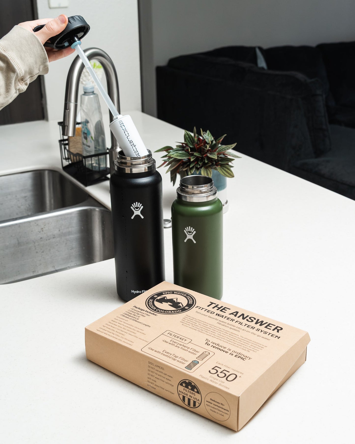 Answer 2.0 water filter compatible with Hydro Flask and Nalgene bottles, shown attached to a clear water bottle.