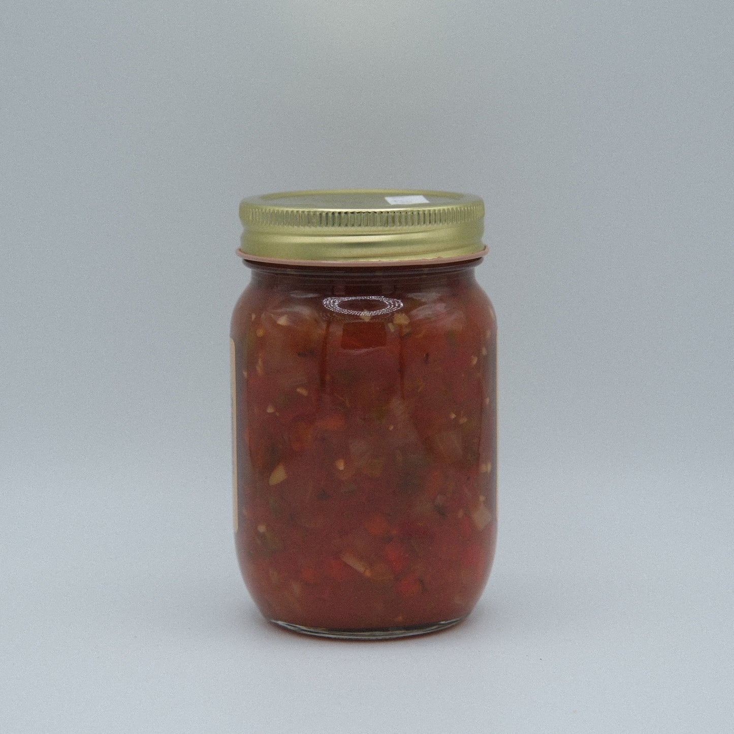 Canned Amish Country Store Medium Salsa in a 14.5 oz jar, showcasing fresh vegetables and tomatoes in a vibrant salsa.