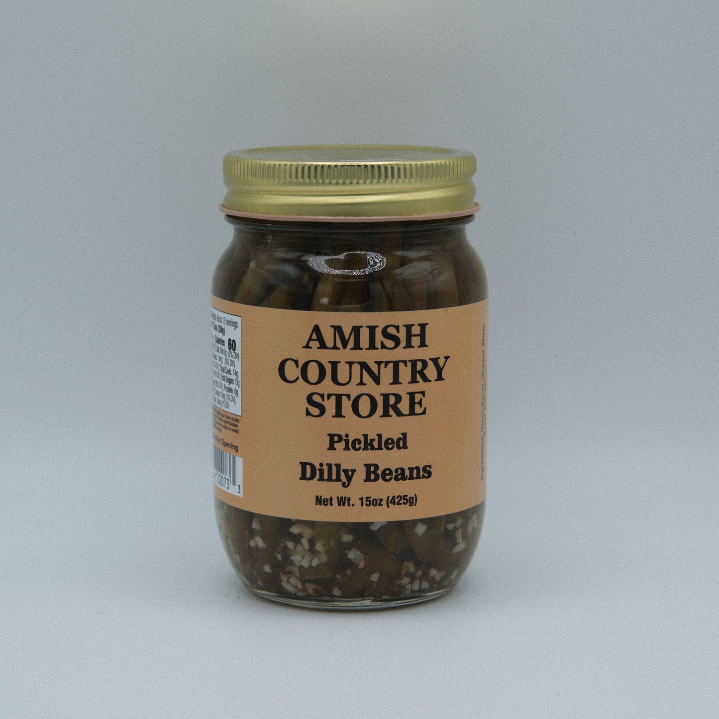 Canned Pickled Dilly Beans from Amish Country Store in a jar with green beans and dill spears visible inside.