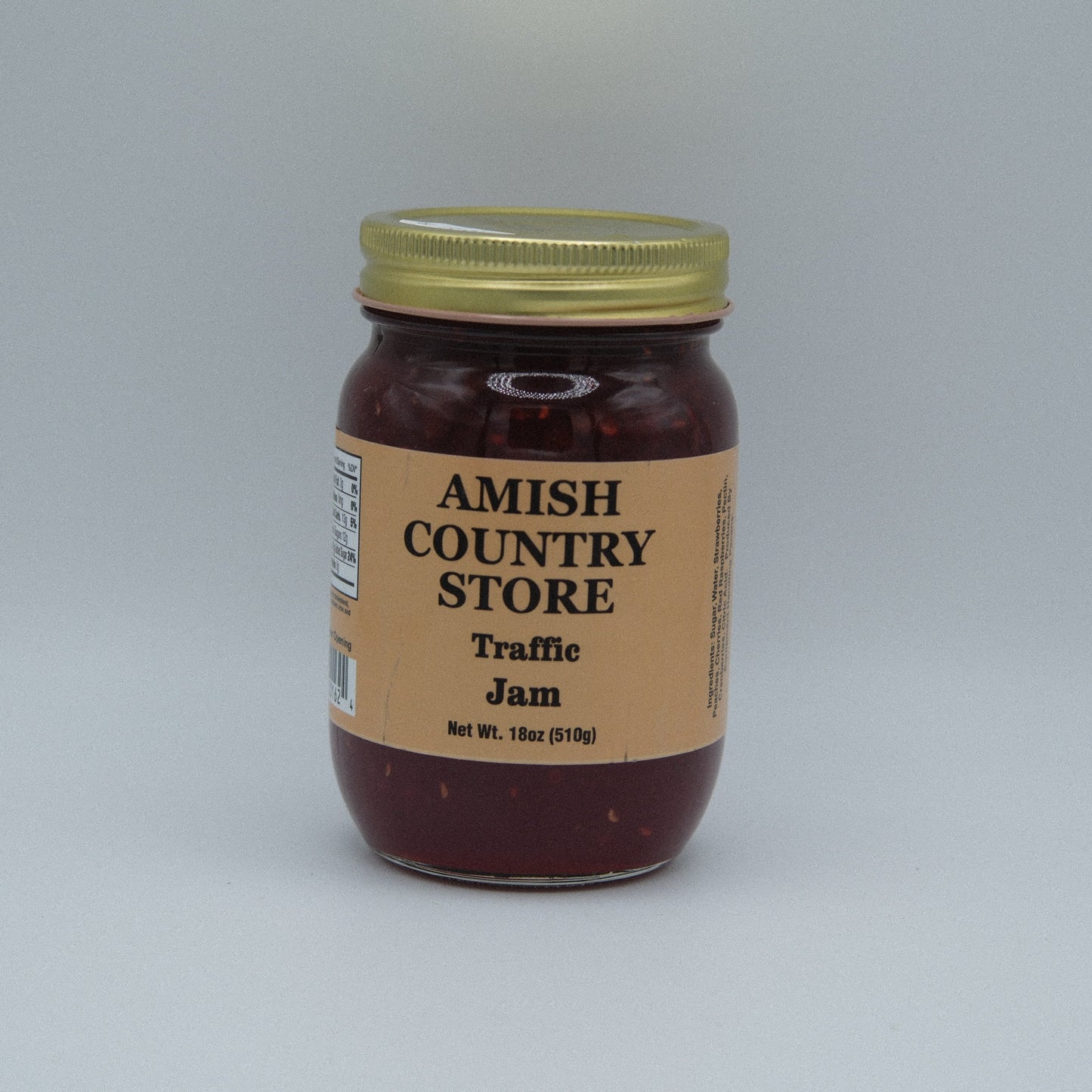 Canned Traffic Jam in 18oz Amish Country Store label, with jar lid and label visible on the product.