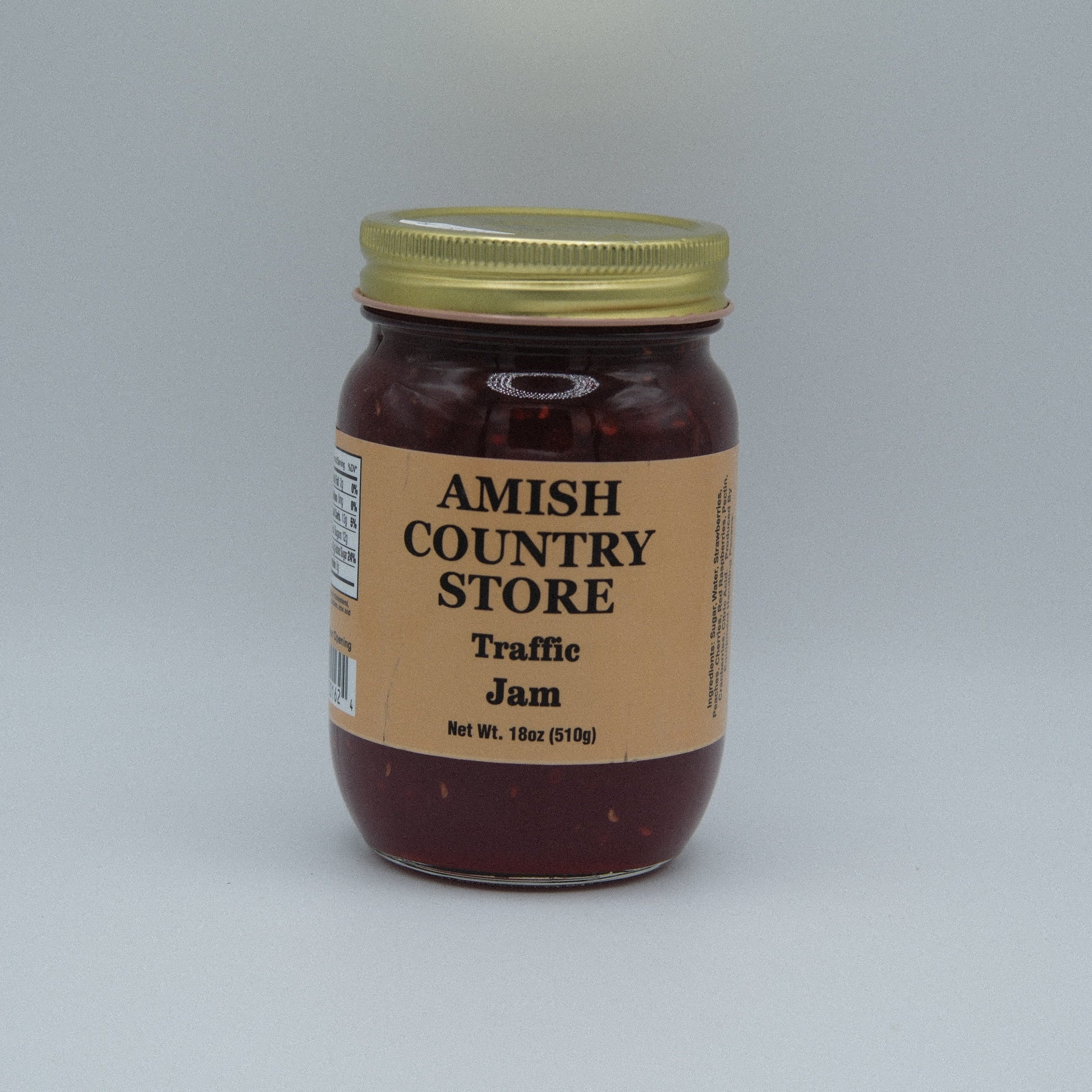 Canned Traffic Jam in 18oz Amish Country Store label, with jar lid and label visible on the product.