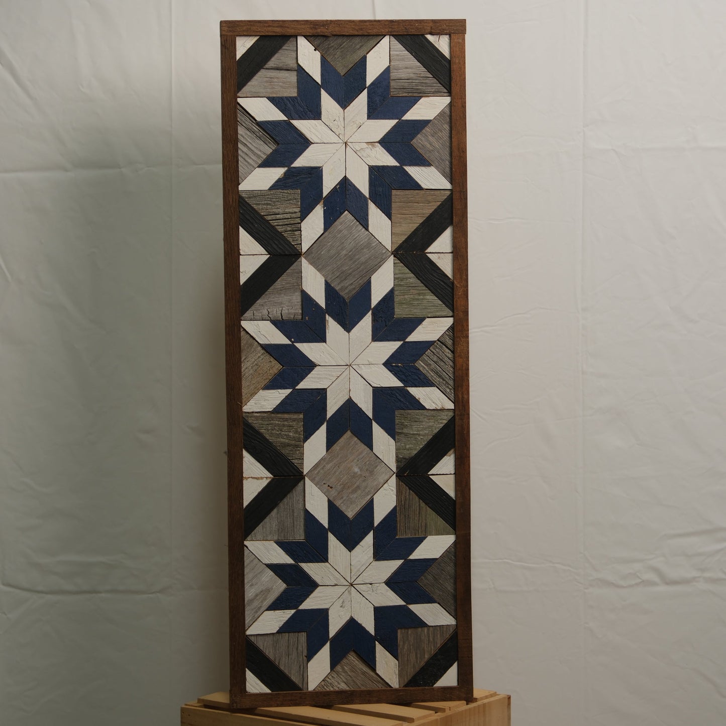 Amish handmade barn quilt banner featuring a colorful geometric pattern, measuring 10.5 x 30 inches, from Amish Country Store.