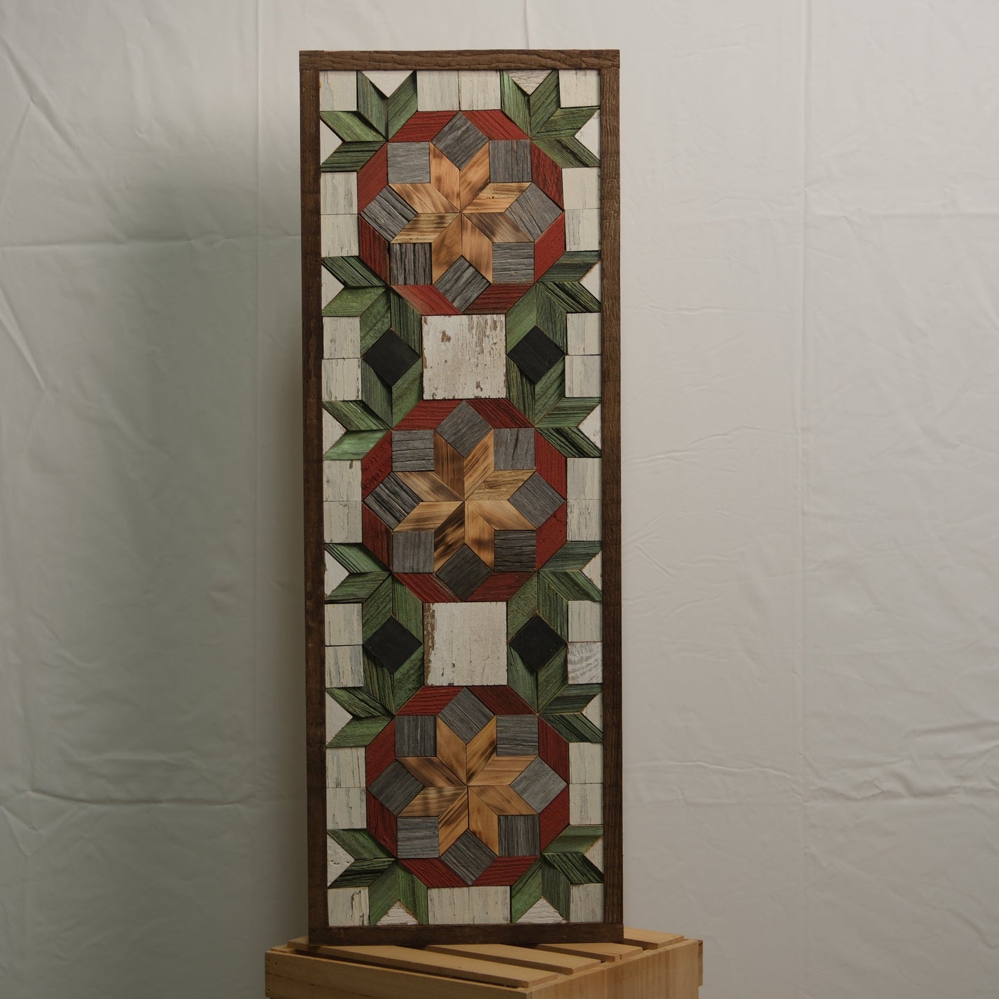 Amish handmade barn quilt banner with traditional geometric patterns, measuring 10.5 x 30 inches, crafted by Amish Country Store.