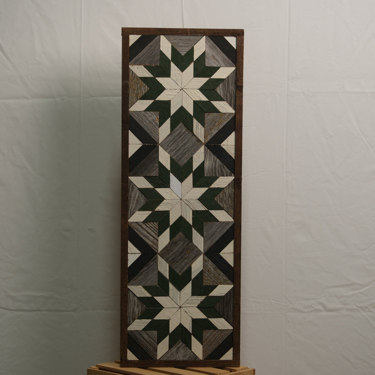 Amish Handmade Barn Quilt banner, 10.5 x 30 inches, featuring traditional geometric patterns on a wooden background.