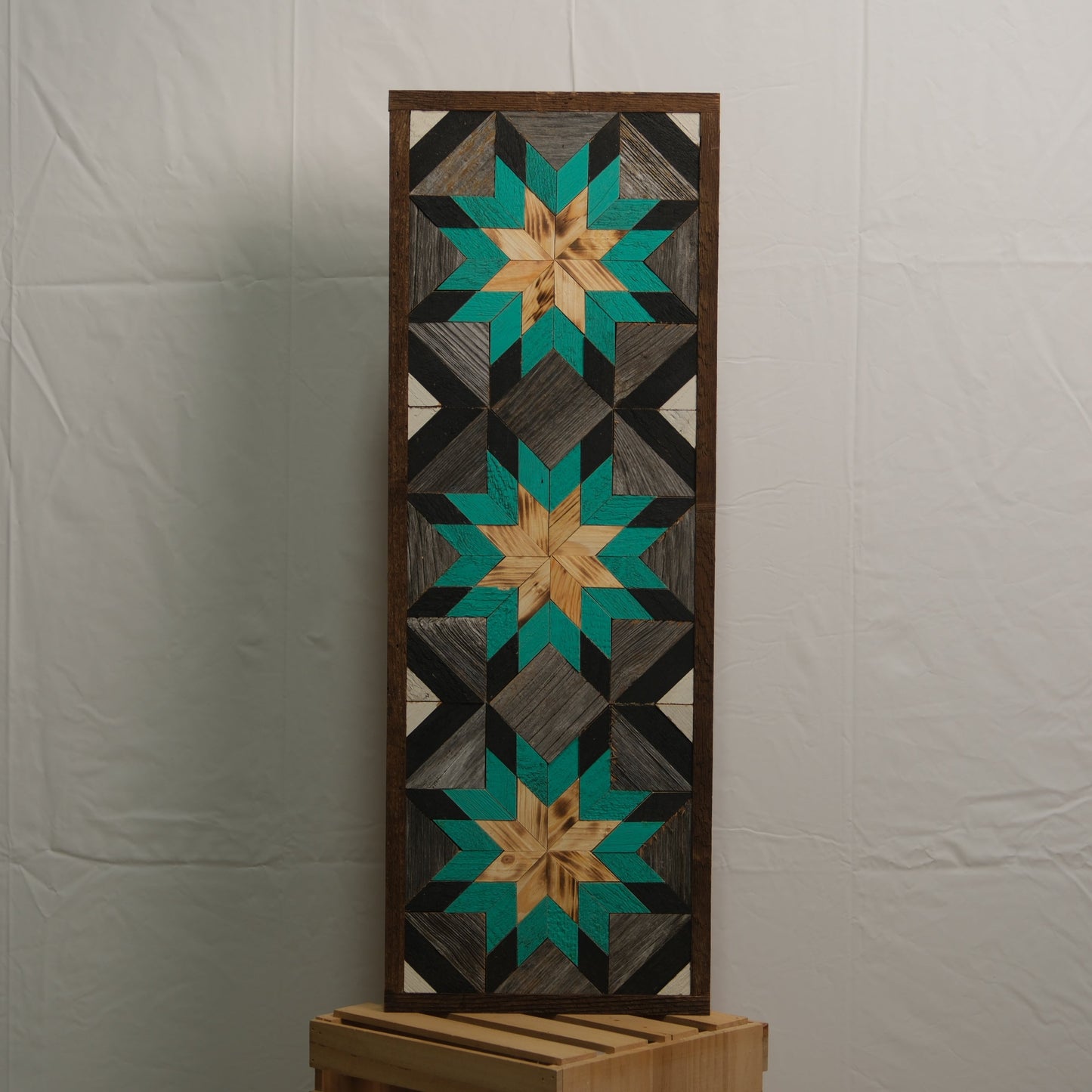 Amish handmade barn quilt banner in vibrant geometric pattern, measuring 10.5 x 30 inches, from Amish Country Store.