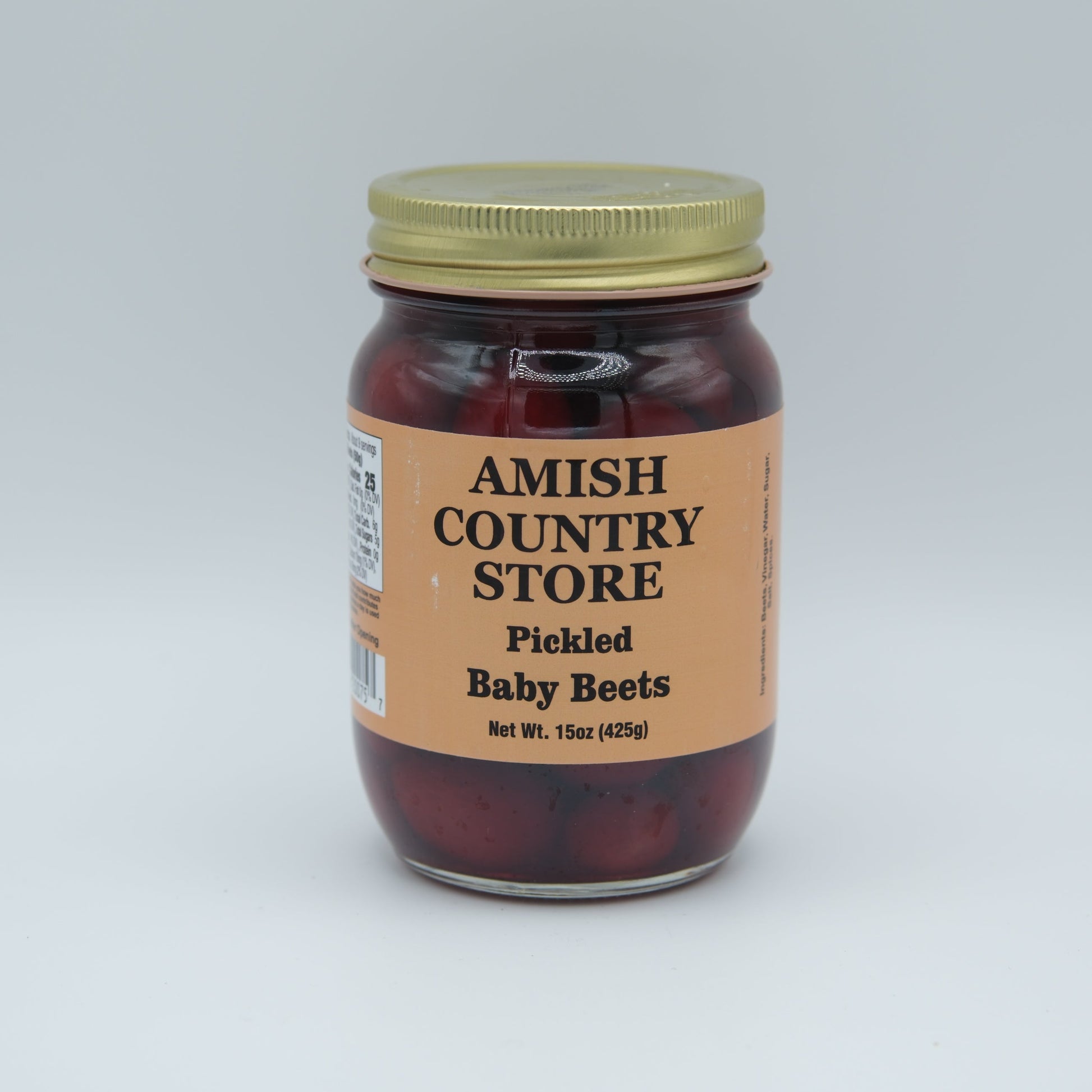 Canned Amish Country Store pickled baby beets in 15oz can, showcasing vibrant red beets in brine.