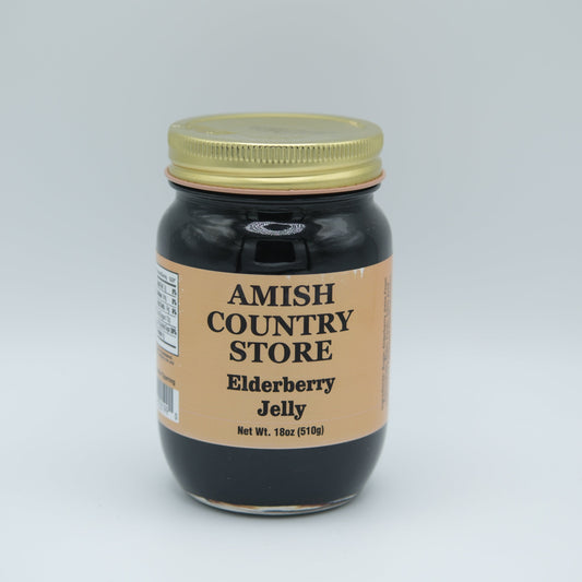 Canned elderberry jelly in an 18 oz jar from Amish Country Store, showcasing the glossy, dark purple fruit spread.