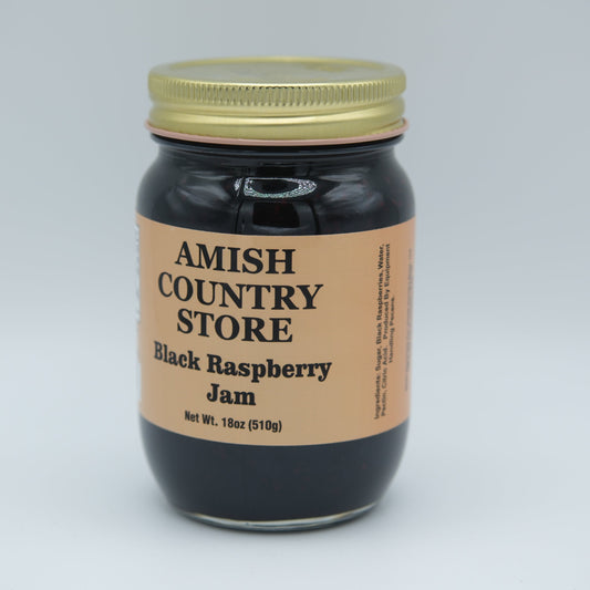 Amish Country Store black raspberry jam in 18 oz canned jar, smooth texture with fresh black raspberry fruit visible.