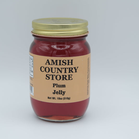 Amish Country Store plum jelly in a 18oz can, smooth purple jam with a glossy surface, ideal for spreading or pairing with foods.