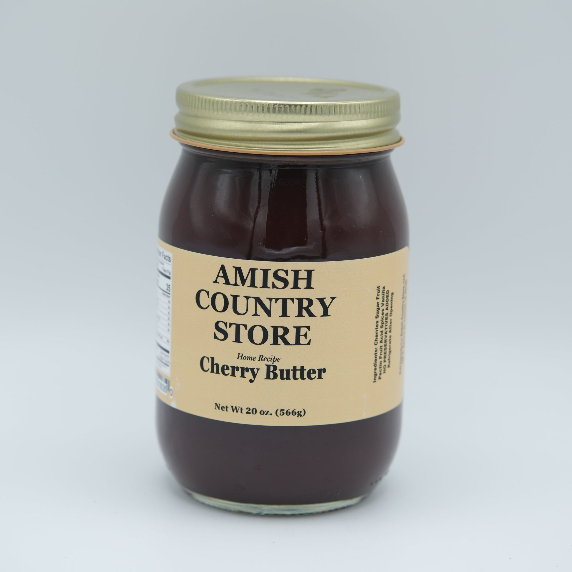 Canned Amish Country Store Cherry Butter jar, 16 oz, smooth red cherry spread in a glass jar with a metal lid.
