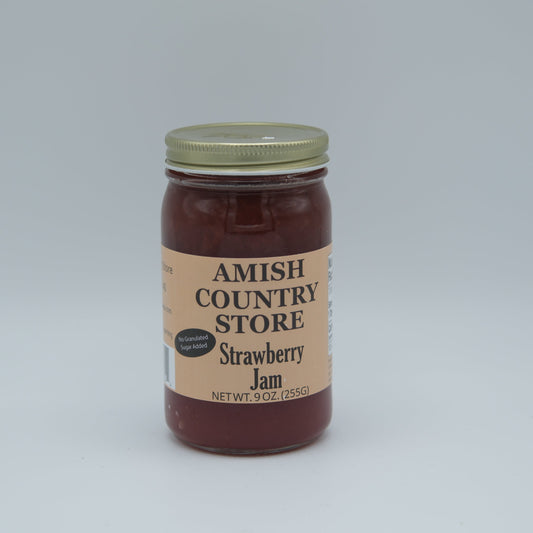 Canned Amish Country Store strawberry jam with no sugar added in an 8 oz jar, showing fresh strawberries and jam texture.