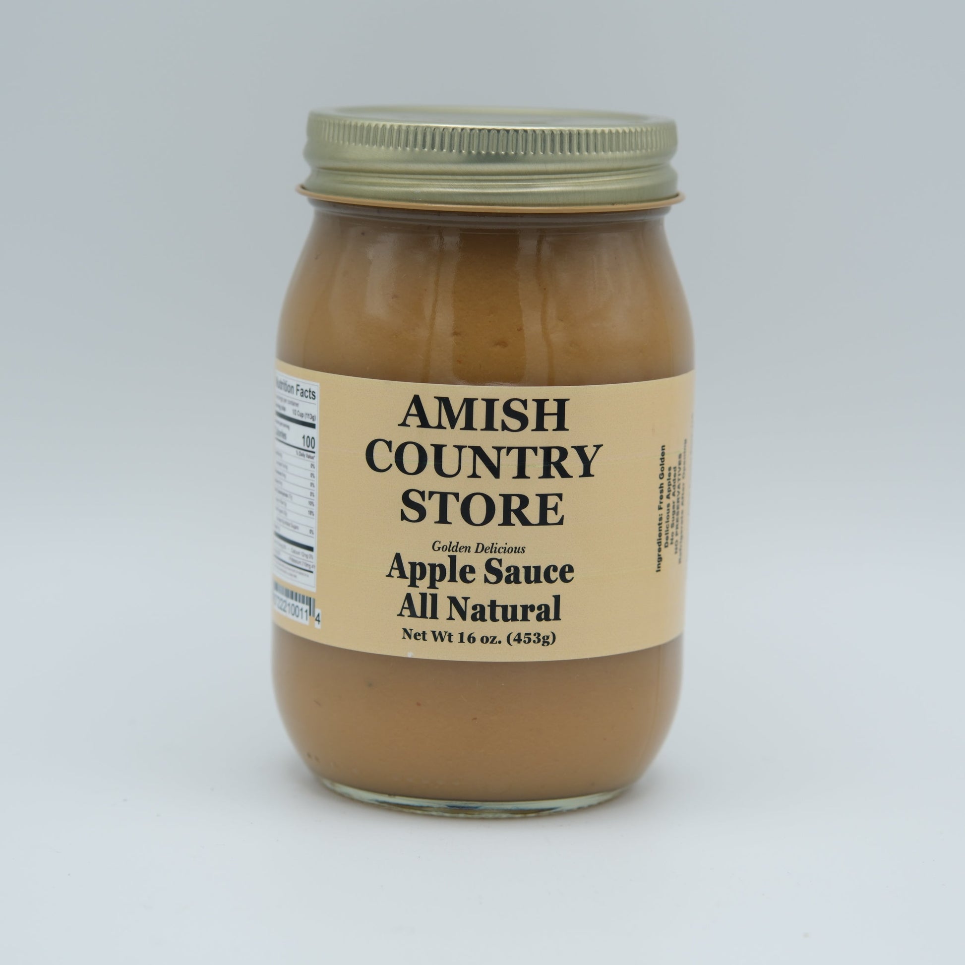 Canned Amish Country Store Golden Delicious Apple Sauce in 19 oz can, no sugar added, showcasing a jar of creamy apple sauce.