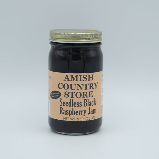 Canned Black Raspberry Seedless Jam by Amish Country Store in a 9 oz jar, no added sugar, smooth and fruity spread.