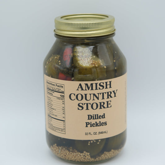 Canned Amish Country Store Dilled Pickles in 32 oz jar with crunchy dill slices and fresh herbs.