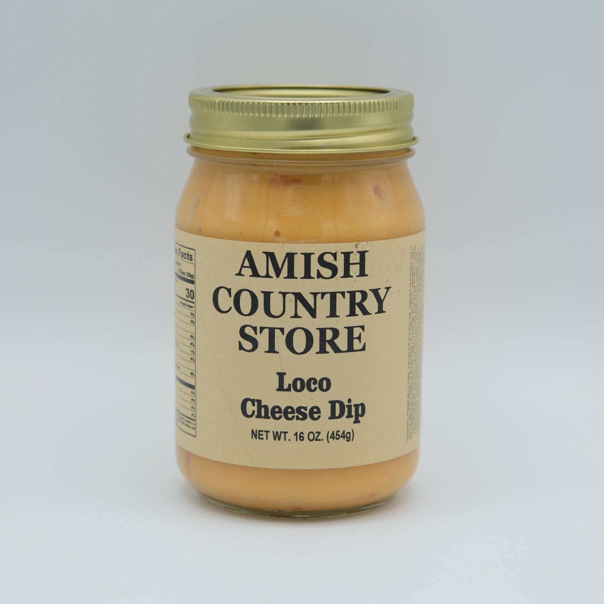Amish Country Store Loco Cheese Dip 16 oz in a can, creamy cheese dip with a smooth texture, ready for snacking or dipping.