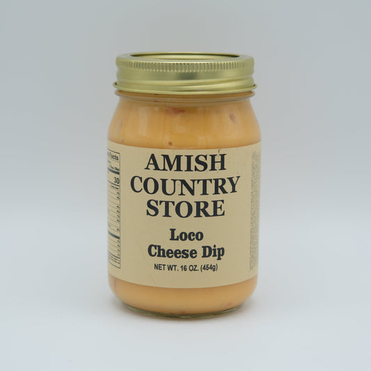 Amish Country Store Loco Cheese Dip 16 oz in a can, creamy cheese dip with a smooth texture, ready for snacking or dipping.