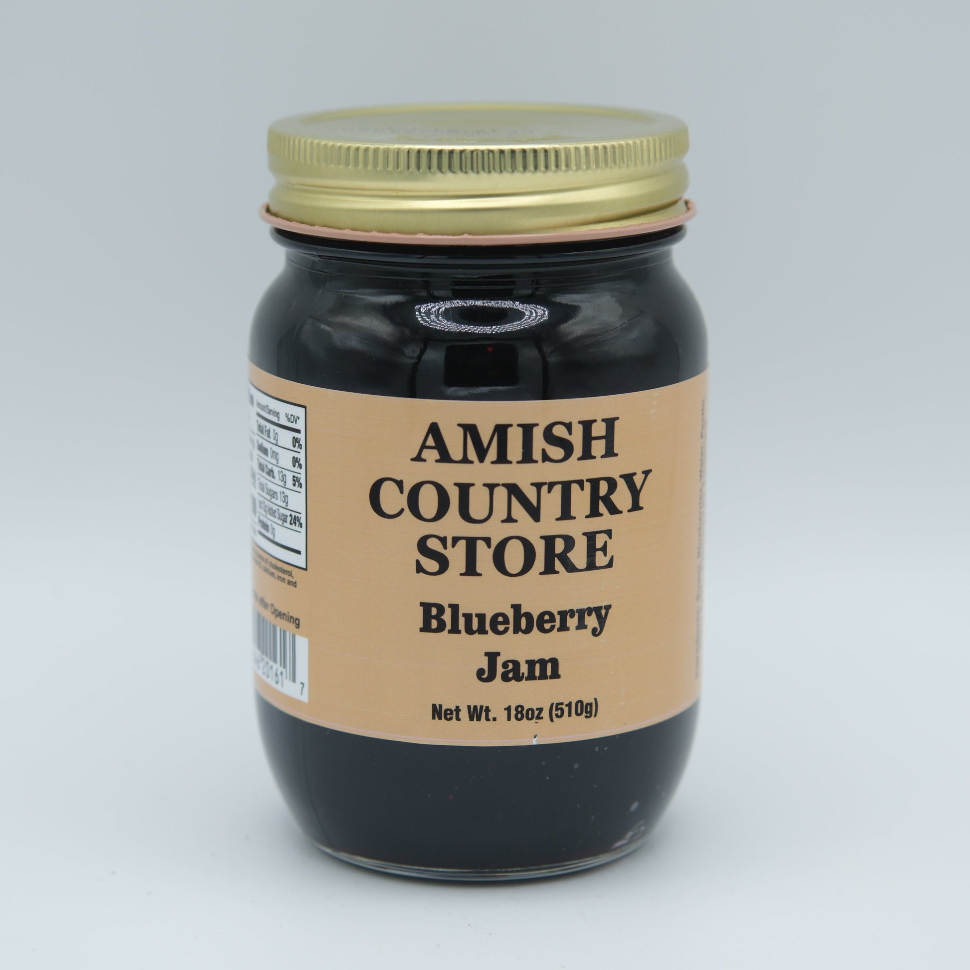 Canned blueberries jam in 18 oz jar from Amish Country Store, showing the blue jam inside a glass jar.