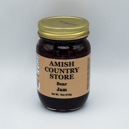 Amish Country Store Bear Jam in an 18 oz canned jar with a label featuring a bear illustration and jam inside.