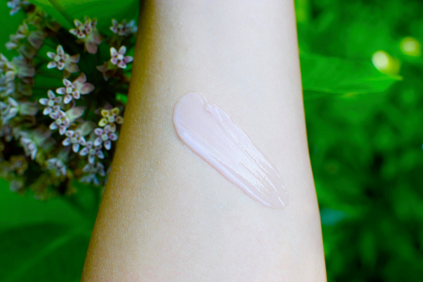 Plant Makeup Strawberry Dreamsicle lip balm scrub jar with pink and white packaging, showcasing the product label and creamy texture.