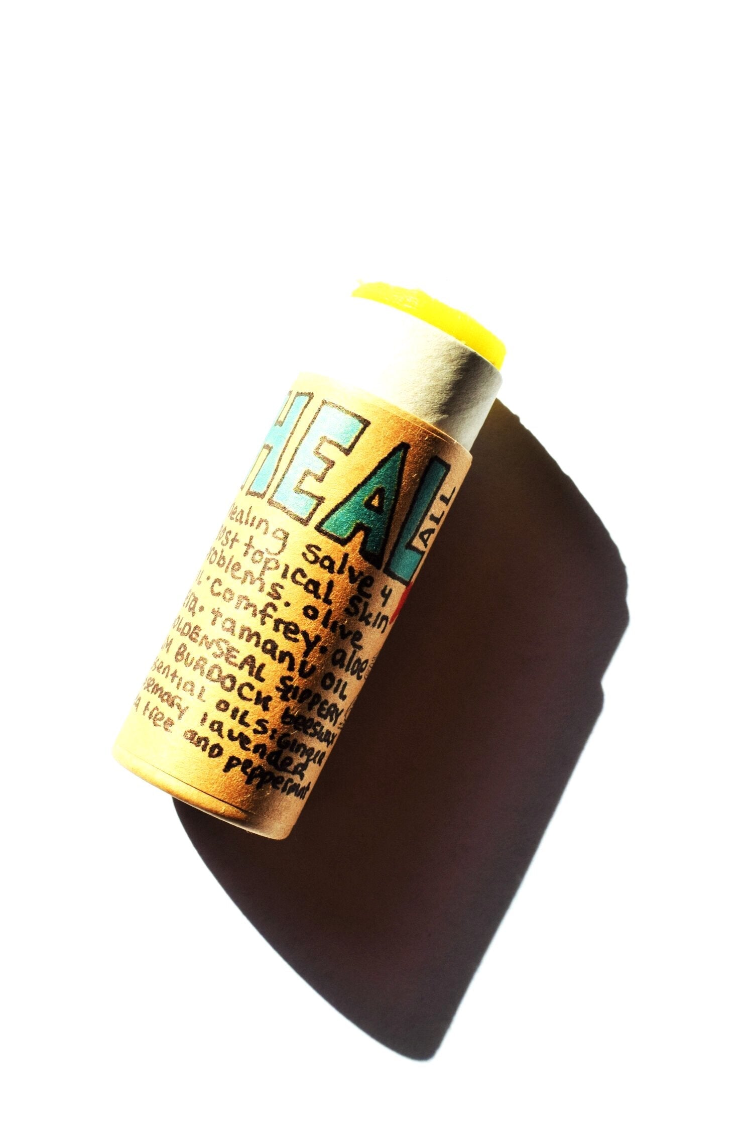 Plant Makeup Heal All Balm jar with label visible, showcasing the natural skincare product in a clear container.