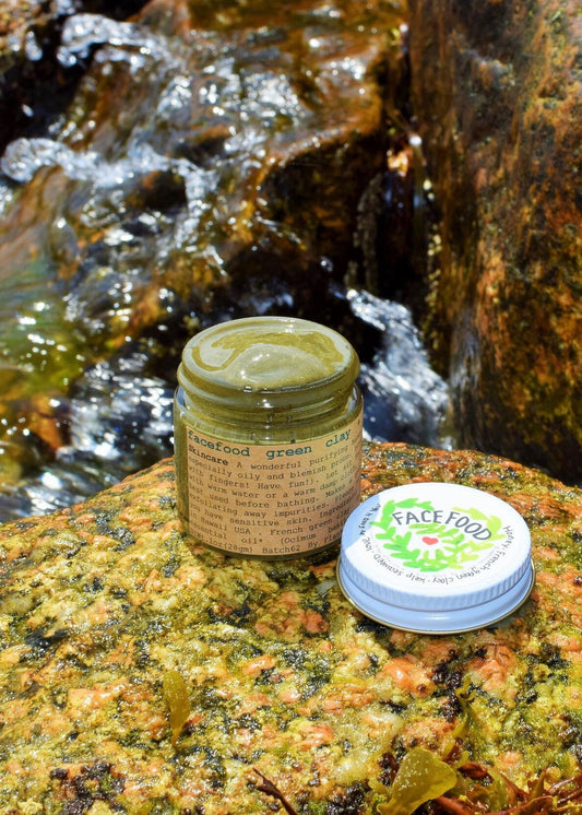 Close-up of Facefood skincare product by plant makeup, showcasing the product container with natural, botanical-inspired packaging.
