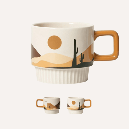 Handcrafted ceramic Desert Vibe artisanal mug with a tan background, showcasing earthy desert-inspired design by Tilley + Me.