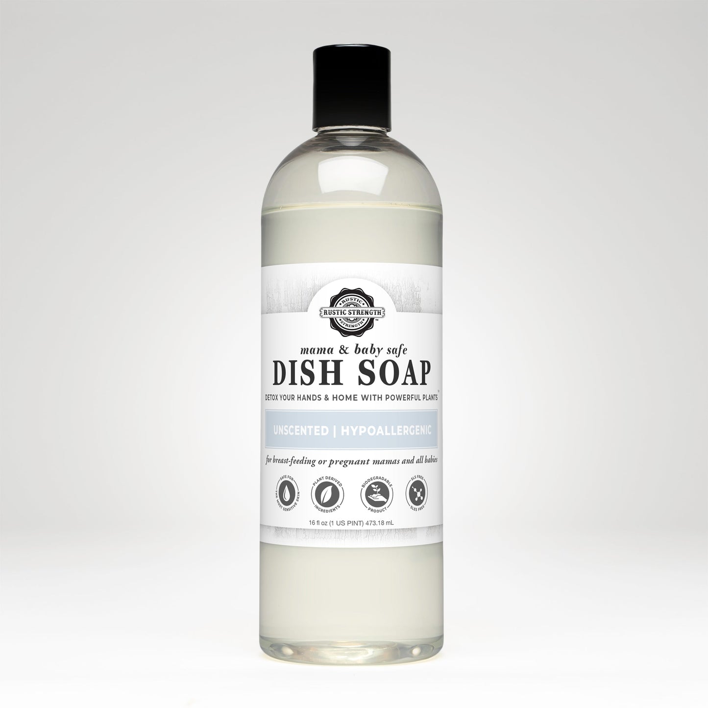 A clear plastic bottle of Rustic Strength Dish Soap | Mama + Baby Safe with a black cap. The unscented, hypoallergenic, and clear formula is baby safe and suitable for breastfeeding or pregnant moms.