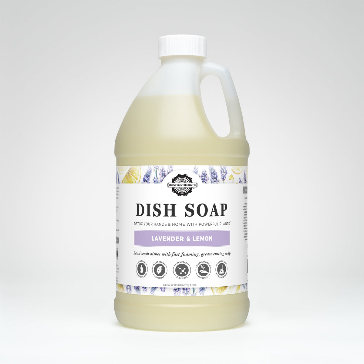 Half-gallon bottle of Rustic Strength lavender and lemon dish soap with a pump dispenser on a kitchen counter.