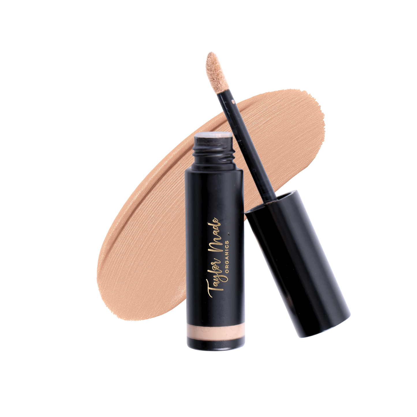 Taylor Made Organics Liquid Organic Concealer in Dune, featuring a smooth application and natural finish on skin.