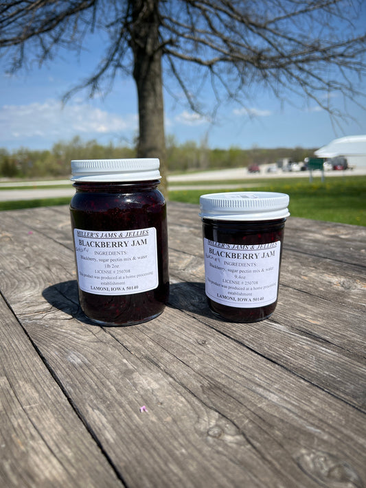 Amish Country Store Miller’s Blackberry Jam jar with a label, showcasing a rich, dark blackberry jam in a glass jar.