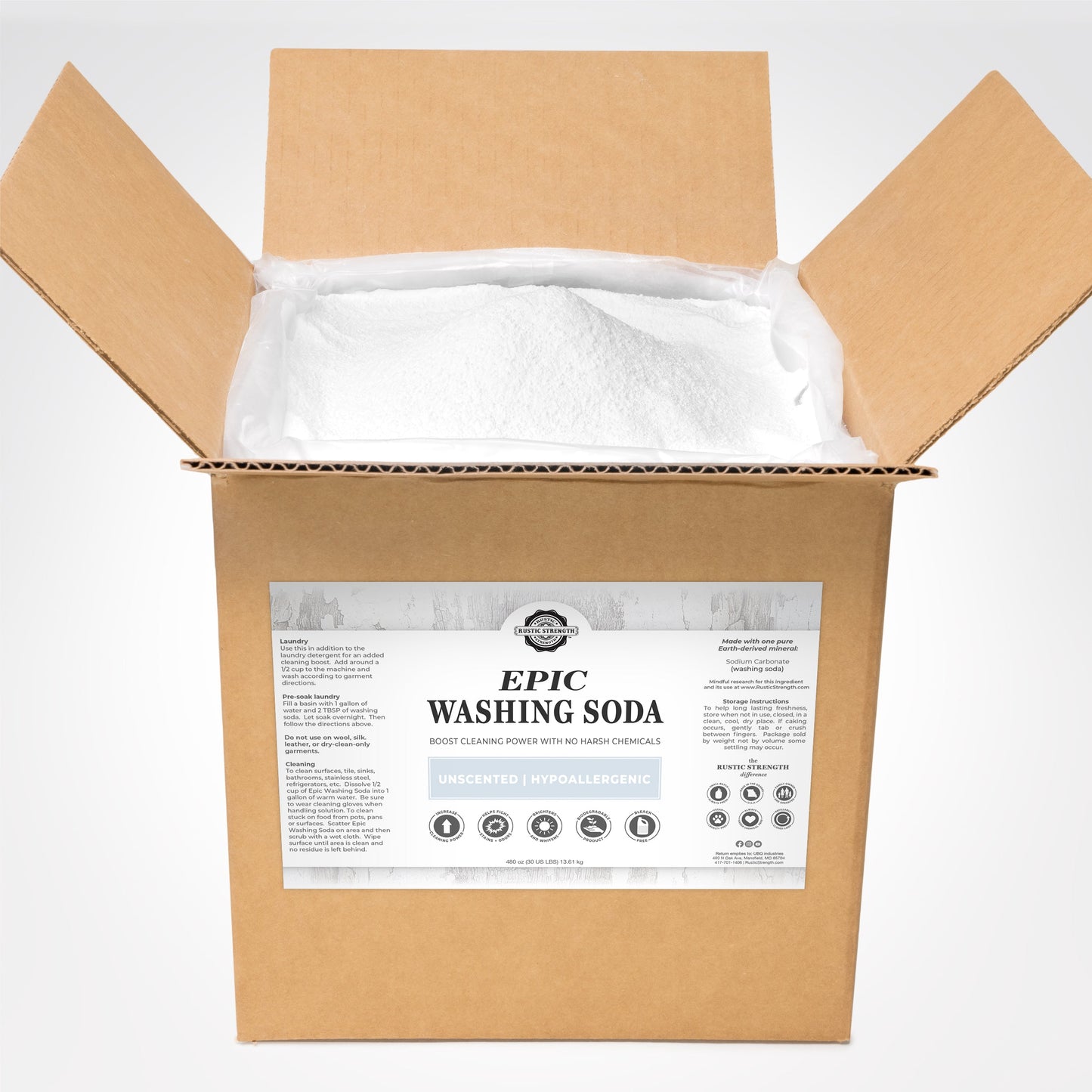 A large open cardboard box filled with white powder labeled Epic Washing Soda by Rustic Strength, an unscented, hypoallergenic laundry boost and biodegradable cleaner.