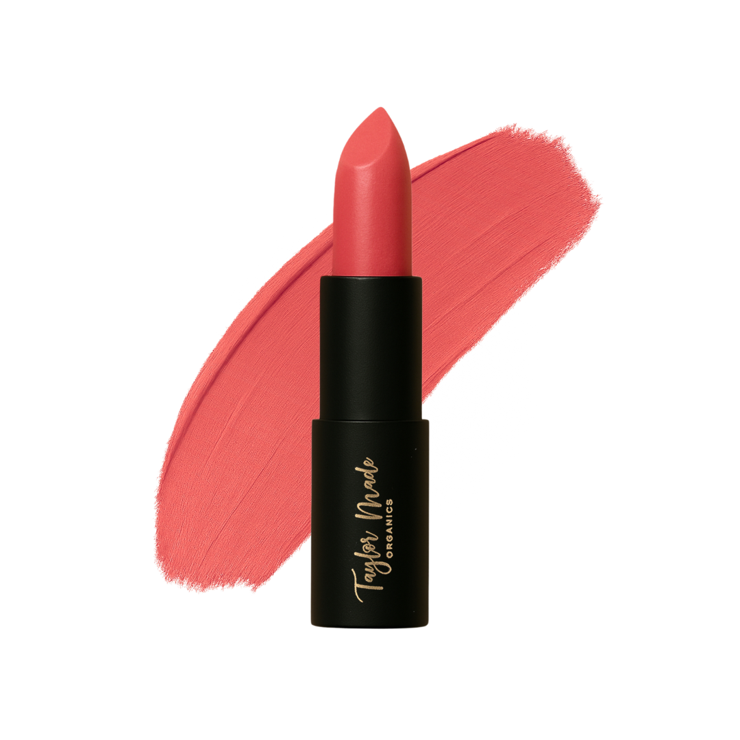 Organic Taylor Made Organics lipstick tube featuring a sleek design and vibrant lipstick shade.